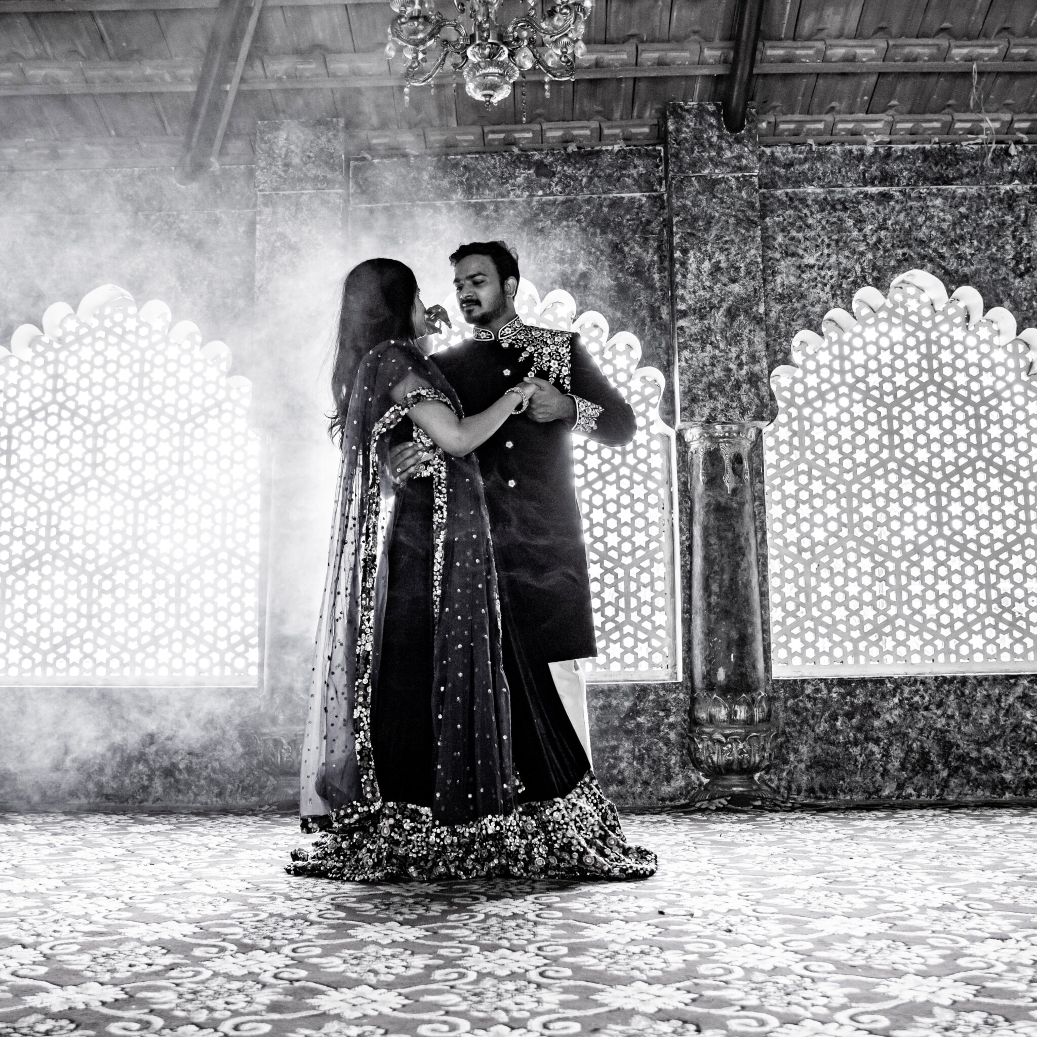 Candid romantic moment between couple during golden hour pre-wedding shoot at KBR Park Hyderabad